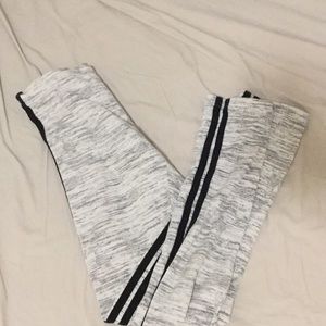 White leggings with black trips on each side